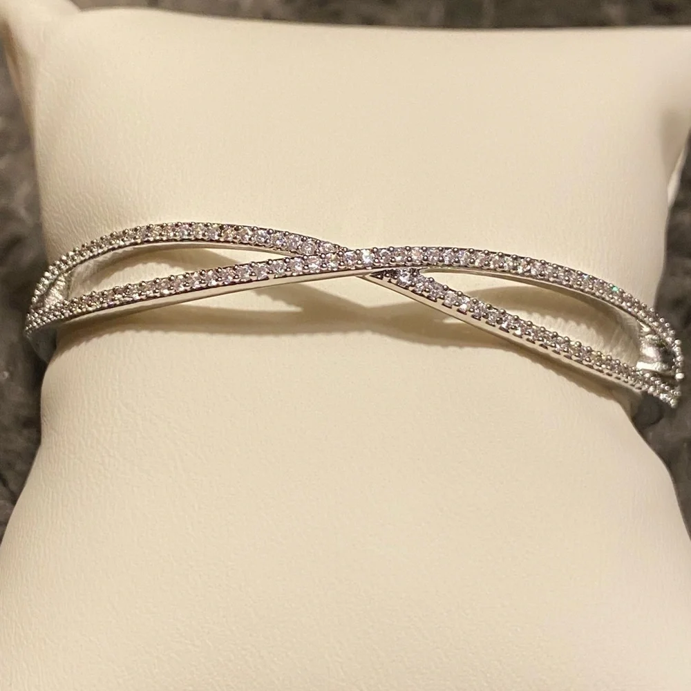 Kate spade cubic zirconia pave silver plated Infinite hinges bangle, new.